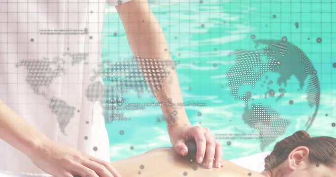 Therapist leaning, using kneading on client back poolside spa, relaxing client with map overlay