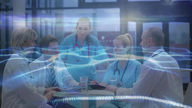 Hospital team reviewing files, doctor rising and extending hand, sealing agreement under waveform