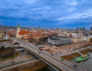 Obraz premium Bratislava night skyline with St Martins Cathedral bridge and reflections