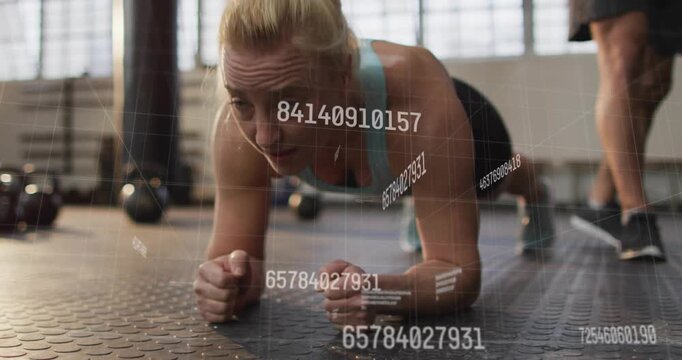 Starting low-plank woman holding elbow plank for core in gym trainer pacing data metrics floating