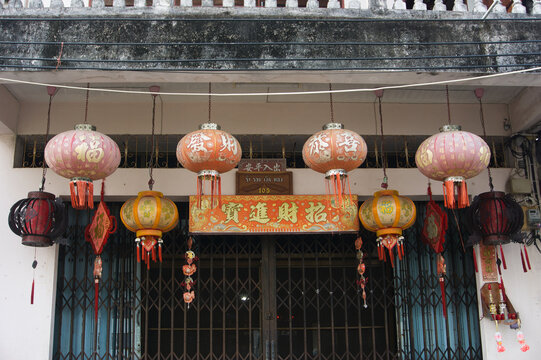 Chinese lanterns hanging outside a house in Phuket Town, Thailand.