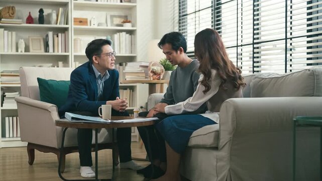 couples therapy session, a marriage counselor consults with a young couple for family therapy, offering relationship counseling, marriage help, family support, anxiety therapy, depression support	