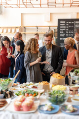 Business networking event with refreshments.