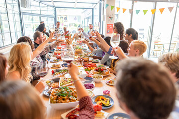 Joyful gathering with shared meal.