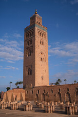 Koutoubia mosque minaret dominating marrakech skyline with blue sky