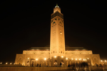 Fototapeta premium Hassan ii mosque minaret silhouette at night