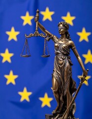 Fototapeta premium Lady Justice statue blindfolded, holding scales & sword, with EU flag background