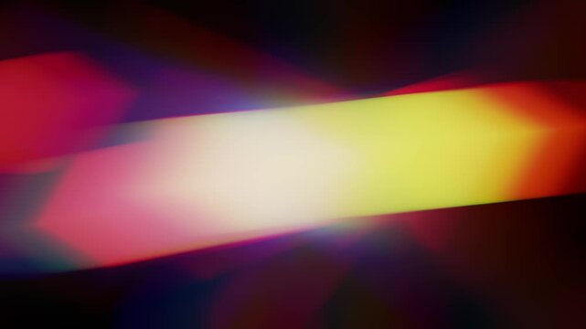 Abstract light beams streak across a dark background. Colors blur into soft gradients