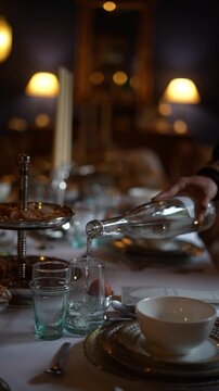 Elegant Moroccan Restaurant Table Setting with Glassware and Candlelight
