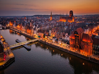 Beautiful old town of Gdansk with historic architecture over the Motlawa river at dusk, Poland