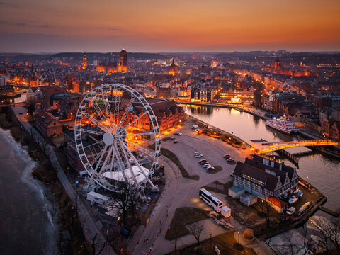Beautiful old town of Gdansk with historic architecture over the Motlawa river at dusk, Poland