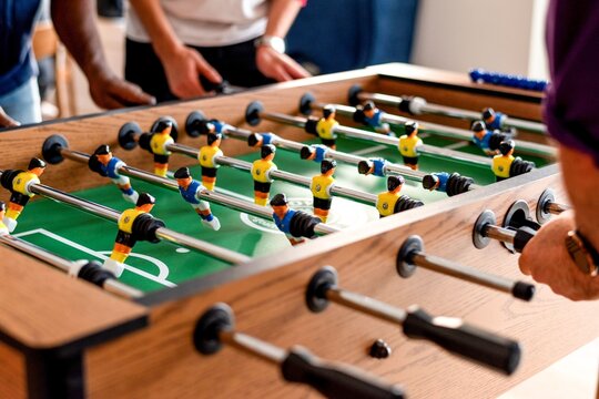 Exciting foosball game action.