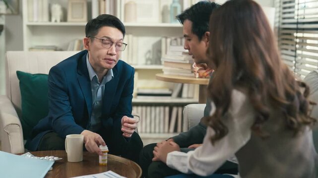 couples therapy session, a marriage counselor consults with a young couple for family therapy, offering relationship counseling, marriage help, family support, anxiety therapy, depression support	