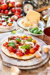 Fresh homemade pizza with ingredients.