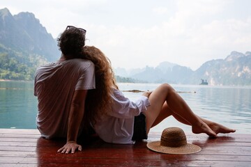 Fototapeta premium Couple relaxing by serene lake