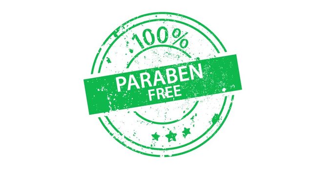 Green circular stamp shows 100% paraben free. Text appears bold and distressed. Background is plain white. Ideal for cosmetic or skincare product branding