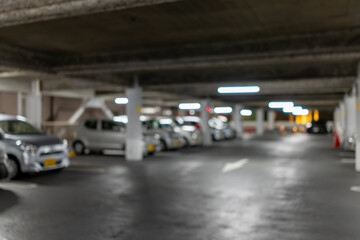 Obraz premium アウトフォーカスの地下駐車場背景