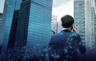 Fototapeta premium Businessman connected in cityscape