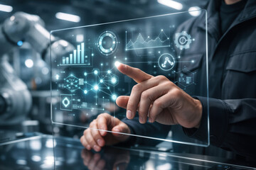 Human machine interface holographic touchscreen in smart factory engineer touching data node with robotic arm automation Industry 4.0 control panel digital visualization