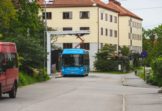 Gothenburg, Sweden - september 03 2023: Electric city bus charging at urban street depot.