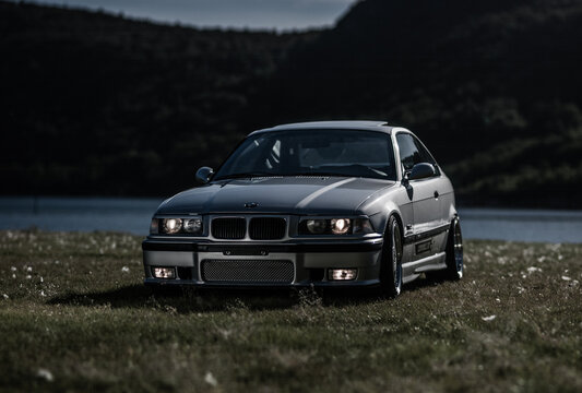Lindesnes, Norway - August 16 2005: Low angle shot of performance coupe in natural setting.