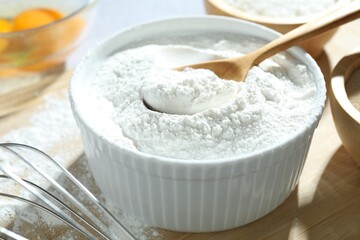 Fototapeta premium Baking powder and other ingredients for making dough on table, closeup