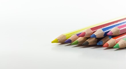 Fototapeta premium Colorful Pencils Arranged on White Background