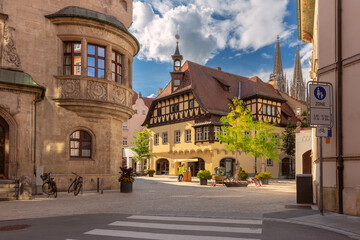 Fototapeta premium Historic houses and cathedral towers in Regensburg old town, Bavaria, on a sunny summer day.