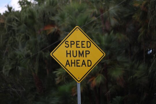 Speed hump ahead sign