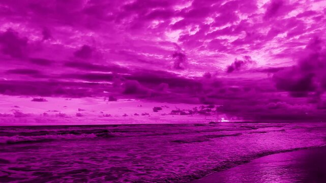ocean waves and cloudy sky. peaceful seascape in magenta tones