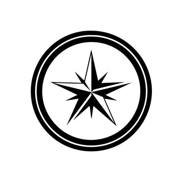 Black compass star navigation symbol.