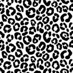 Fototapeta premium Black leopard spots on white background.