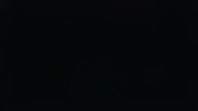 A dramatic view of a dark, ancient ruin with a bright light at the end, evoking a sense of mystery and hope. Perfect for marketing or evoking a feelin