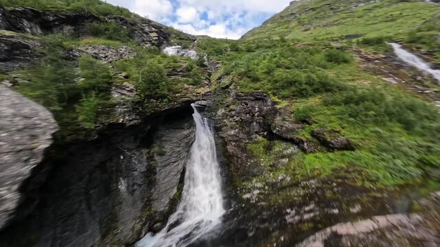 Aerial View of a Powerful Waterfall Cascading Down Gren Rocky Mountain Slopes i Norway