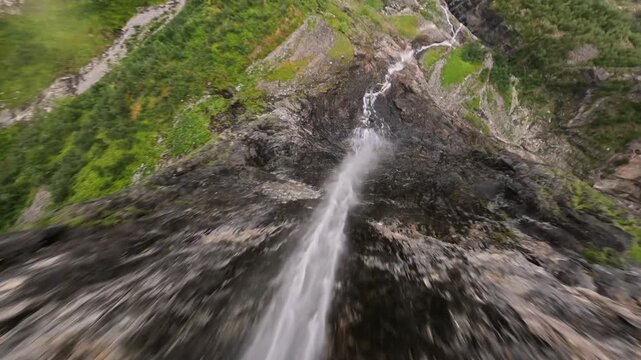 Extreme FPV Drone Proximity Flight Diving Down a Stee Waterfall and Cliff