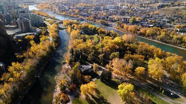 Prince's Island Park autumn foliage scenery. Aerial view of Downtown City of Calgary, Alberta, Canada.