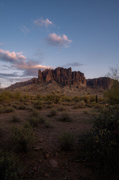 Beautiful sunset at Lost Dutchman park, superstition mountains view. Vertical travel banner