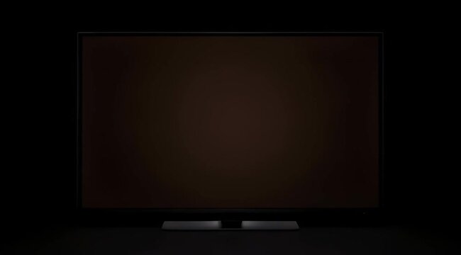 Minimalist smart TV screen mockup in dark room, sleek television display on stand, blank black monitor for video presentation