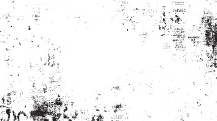 Fototapeta premium Black ink splatters and smudges on a white textured background resembling aged paper or distressed canvas