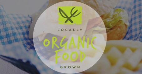 Centering translucent circular badge over sandwich and waffle fries on tabletop, showing lime logo © vectorfusionart