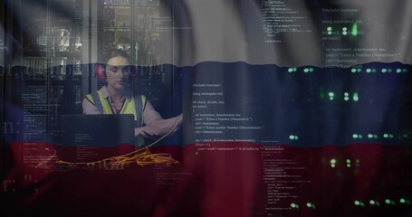 Fixing tech hi-vis red muffs patching yellow LAN cables using laptop near server LEDs, code overlay