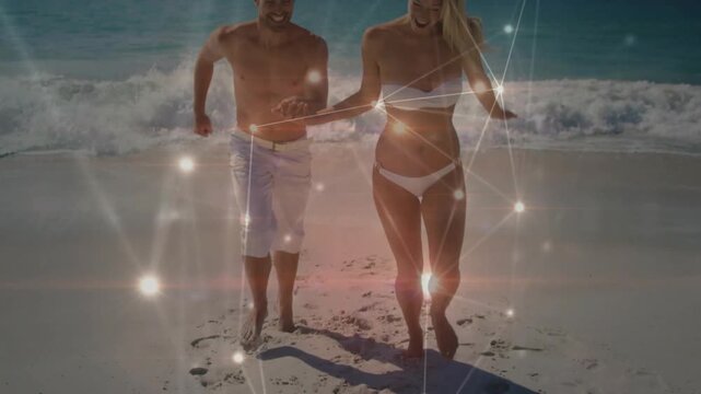 Man and woman laughing, holding-hands running toward camera on beach, overlay nodes syncing ads