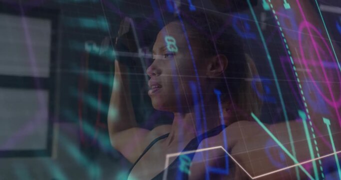 Woman raising arms overhead in gym, initiating HUD neon graphs sweeping torso, tracking performance