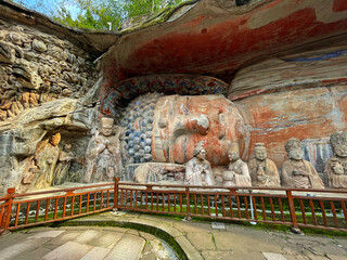 The magnificent Reclining Buddha is the crown jewel of the Dazu Rock Carvings. Spanning over 31 meters, it depicts the Buddha entering Nirvana with a serene expression, surrounded by his disciples