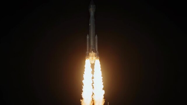 Night launch of a space rocket lifting off from the launchpad with smoke and fire