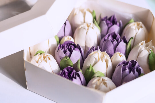 Homemade marshmallows in the shape of purple tulips. Sweets in a healthy diet. 
