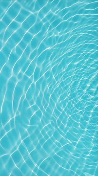 Water ripple wave reflection pattern texture surface abstract turquoise blue swimming pool water surface clear blue pool background with bright summer calm liquid wave texture reflection pattern