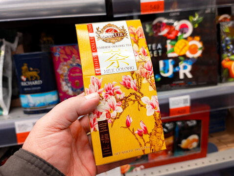 Holding a box of Passiflora milk oolong tea in a supermarket in New York