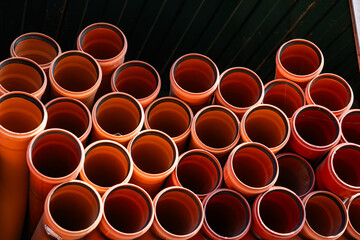 Stacking plastic drainage pipes for construction and infrastructure development
