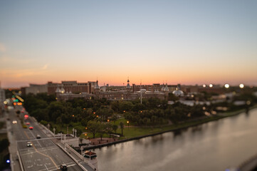 Aerial tilt-shift view of Tampa skyline and University at sunset